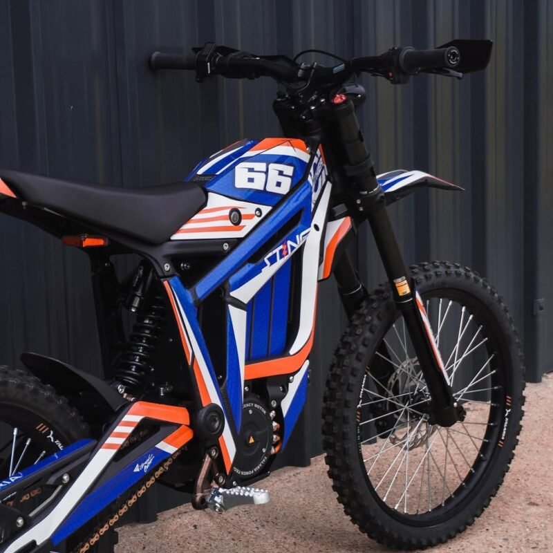 Talaria XXX with number 66 orange graphics, front three quarter view